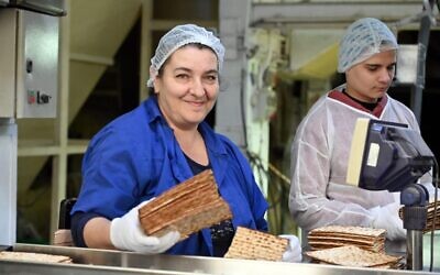 Alina Tirnovienko, a recent immigrant to Israel from Odesa, Ukraine, works in the Matzot Aviv factory. (Courtesy IFCJ)