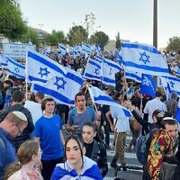 Supporters of the government's planned judicial overhaul rally in Jerusalem, March 27, 2023. (Carrie Keller-Lynn/Times of Israel)