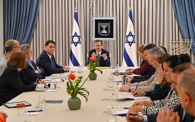 President Isaac Herzog hosts delegations from Likud, Yesh Atid and National Unity for judicial overhaul negotiations at his residence in Jerusalem, March 28, 2023. (Kobi Gideon/ GPO)