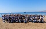 Participants in ths ninth annual Champions of the Flyway international bird-spotting contest, photographed in Eilat, southern Israel, March 27, 2023. (Dov Greenblat, Society for the Protection of Nature in Israel)