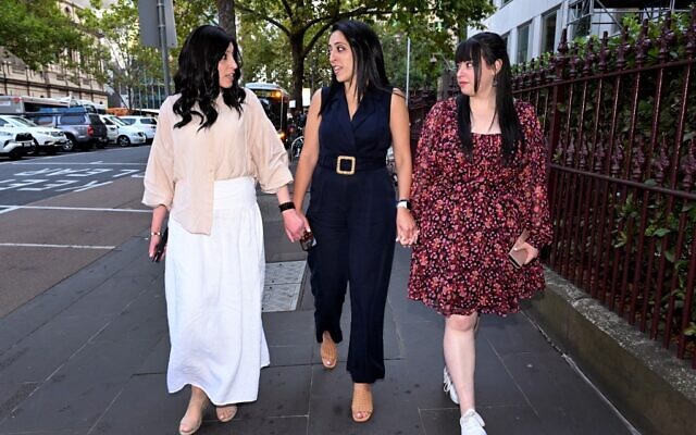 Sisters Nicole Meyer (L), Elly Sapper (C) and Dassi Erlich (R) leave the County Court in Melbourne on April 3, 2023, after the trial of former school principal Malka Leifer. (William WEST / AFP)