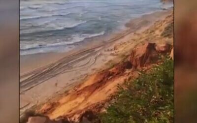 A collapsed coastal cliff in Netanya, April 21, 2023. (Channel 12 screenshot: used in accordance with Clause 27a of the Copyright Law)