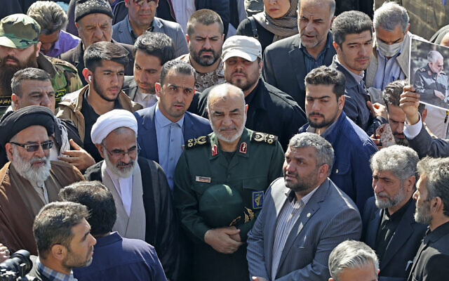 IRGC chief Hossein Salami (C) attends the funeral procession for two of Iran's revolutionary guard forces killed in strikes blamed on Israel in Syria, held in Tehran on April 4, 2023 (ATTA KENARE / AFP)