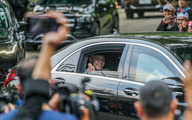 Central Java governor Ganjar Pranowo waves to journalists after he was selected by the country's largest political party, Indonesian Democratic Party of Struggle, as its candidate for the 2024 presidential election in Bogor on April 21, 2023. (Aditya Aji/AFP)