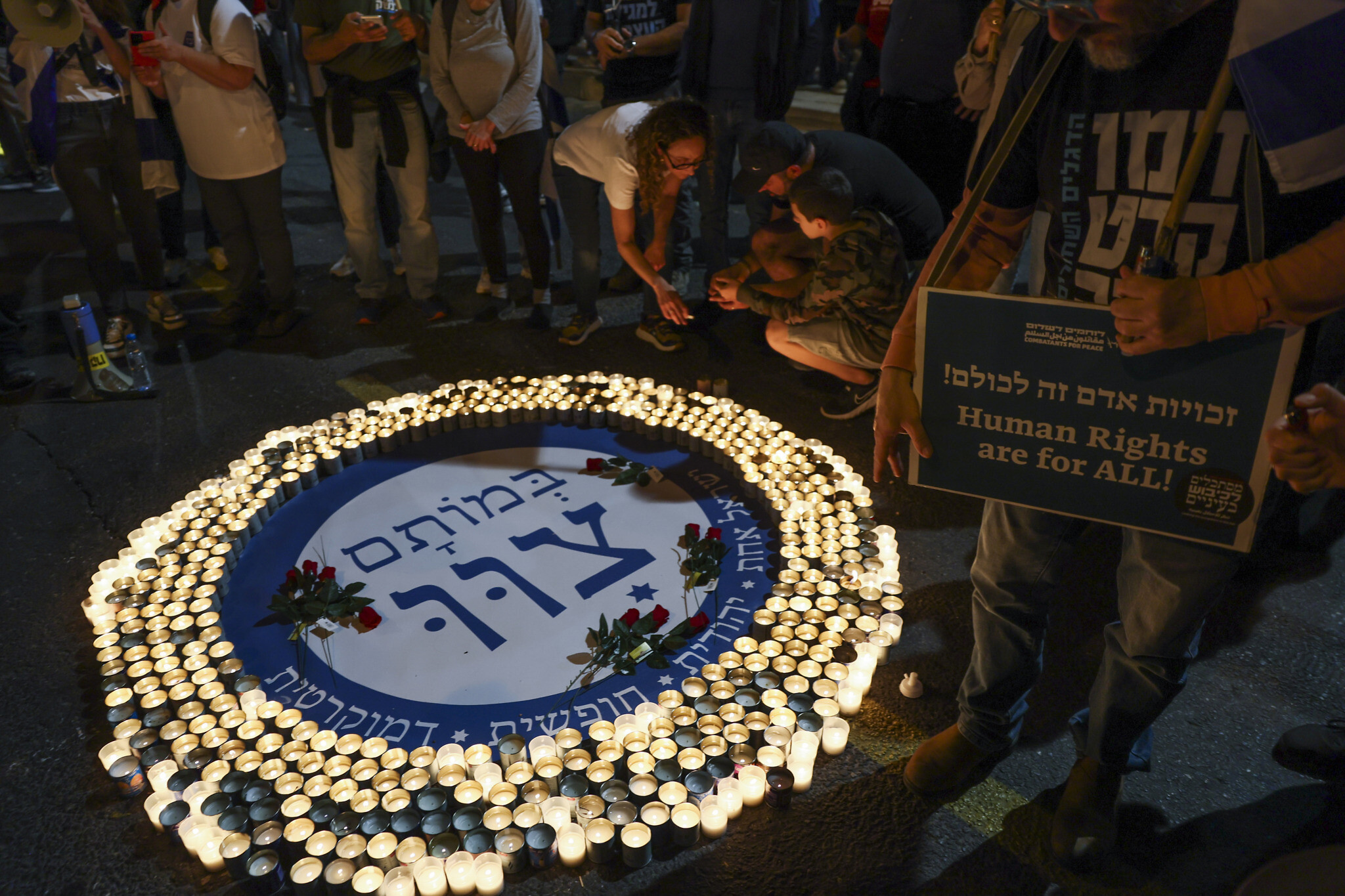 With memorial candles, protesters across Israel rally against judicial ...