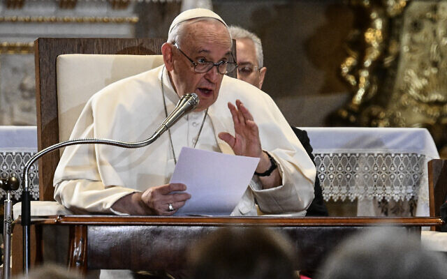 Pope Francis speaks during a meeting in St. Stephen's cathedral in Budapest on April 28, 2023. (Vincenzo Pinto/AFP)