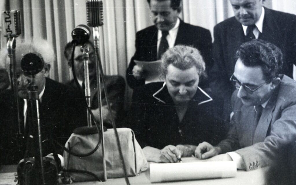 Rachel Cohen-Kagan signs the Israeli Declaration of Independence (Image Courtesy of ISA)