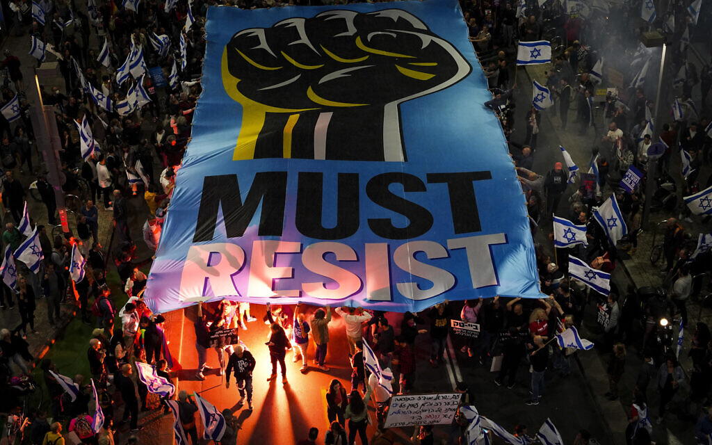 Israelis protest against plans by Prime Minister Benjamin Netanyahu's government to overhaul the judicial system, in Tel Aviv, Israel, Saturday, March 4, 2023. (AP Photo/Tsafrir Abayov)