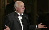 Seymour Stein accepts his award during the Rock and Roll Hall of Fame induction ceremony, in New York, March 14, 2005. (AP Photo/Julie Jacobson/File)