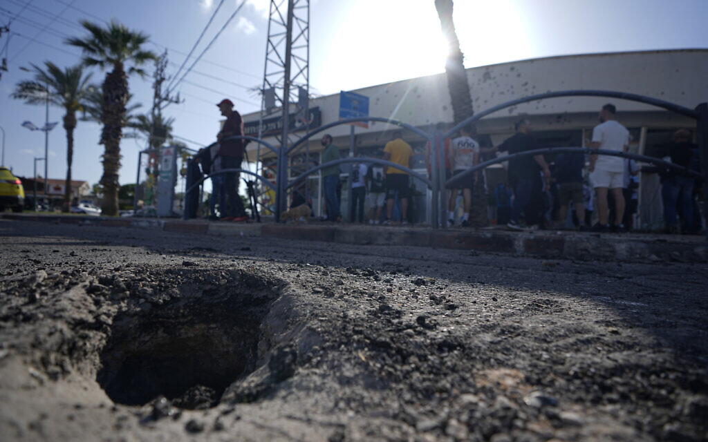 The crater from a rocket fired from Lebanon that landed in Shlomi, northern Israel, April 6, 2023. (AP Photo/Ariel Schalit)