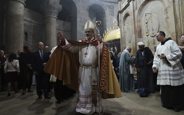 File: Latin Patriarch of Jerusalem Pierbattista Pizzaballa leads the Easter Sunday Mass at the Church of the Holy Sepulchre, where many Christians believe Jesus was crucified, buried and rose from the dead, in the Old City of Jerusalem, April 9, 2023. (AP Photo/Mahmoud Illean)