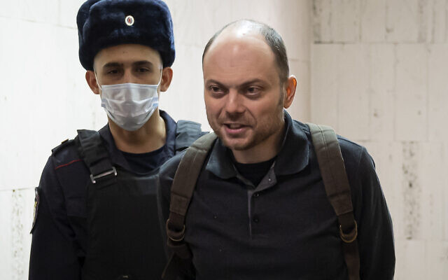 Russian opposition activist Vladimir Kara-Murza is escorted to a hearing in a court in Moscow, Russia, February 8, 2023. (AP Photo)