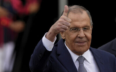 Russia's Foreign Minister Sergey Lavrov gives a thumbs up after meeting with Brazilian Foreign Minister Mauro Vieira as he leaves Itamaraty Palace in Brasilia, Brazil, April 17, 2023. (AP Photo/Eraldo Peres)