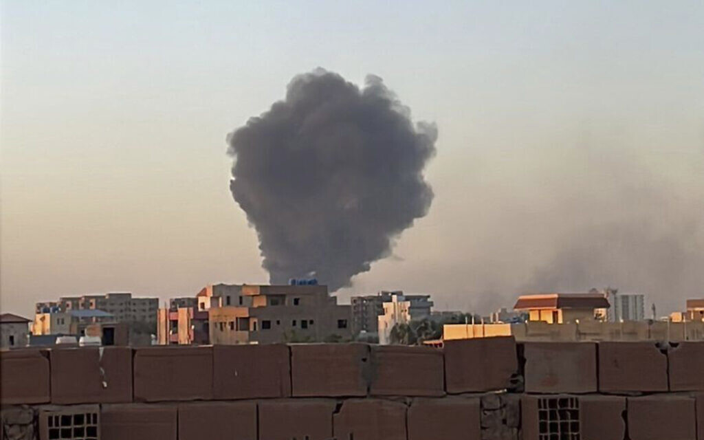 In this photo provided by Maheen S , smoke fills the sky in Khartoum, Sudan, near Doha International Hospital on April 21, 2023. (Maheen S via AP)