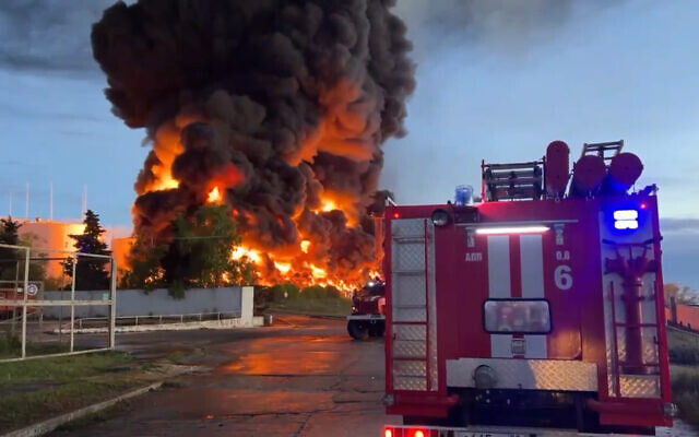 Smoke and flames rise from a burning fuel tank in Sevastopol, Crimea, on April 29, 2023. (Sevastopol Governor Mikhail Razvozhaev telegram channel via AP)