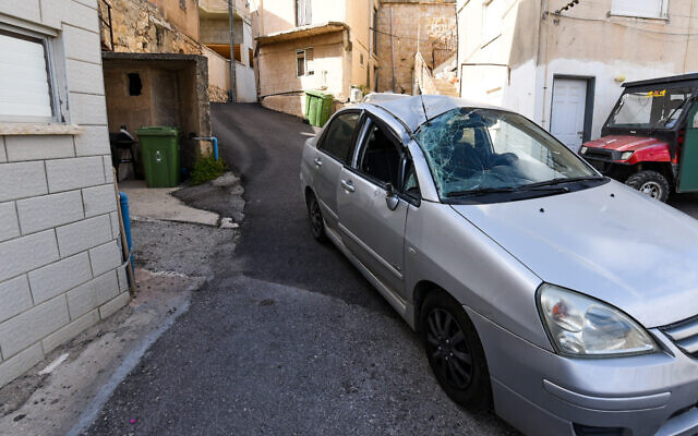 Israeli security at the scene where a rocket fired from Lebanon hit a village in northern Israel, April 6, 2023. (Ayal Margolin/Flash90)