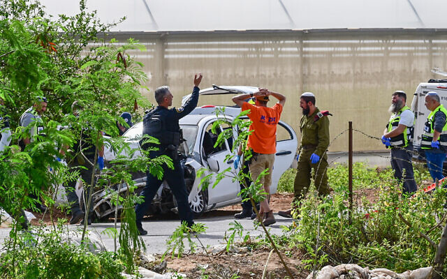 Security forces at the scene of a deadly terror attack in the Jordan Valley on April 7, 2023. (Michael Giladi/Flash90)