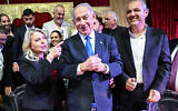 Prime Minister Benjamin Netanyahu and his wife Sara attend a Mimouna event in Hadera on April 12, 2023. (Rami Shllush/POOL)