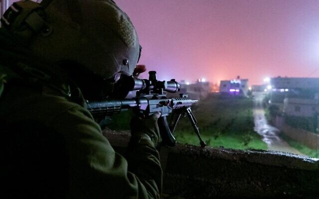 An IDF marksman is seen during an early morning operation in the West Bank, April 13, 2023. (Israel Defense Forces)