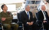 IDF Chief of Staff Herzi Halevi (left), Prime Minister Benjamin Netanyahu (center), and Defense Minister Yoav Gallant, at an army ceremony on April 3, 2023. (Ariel Hermoni/Defense Ministry)