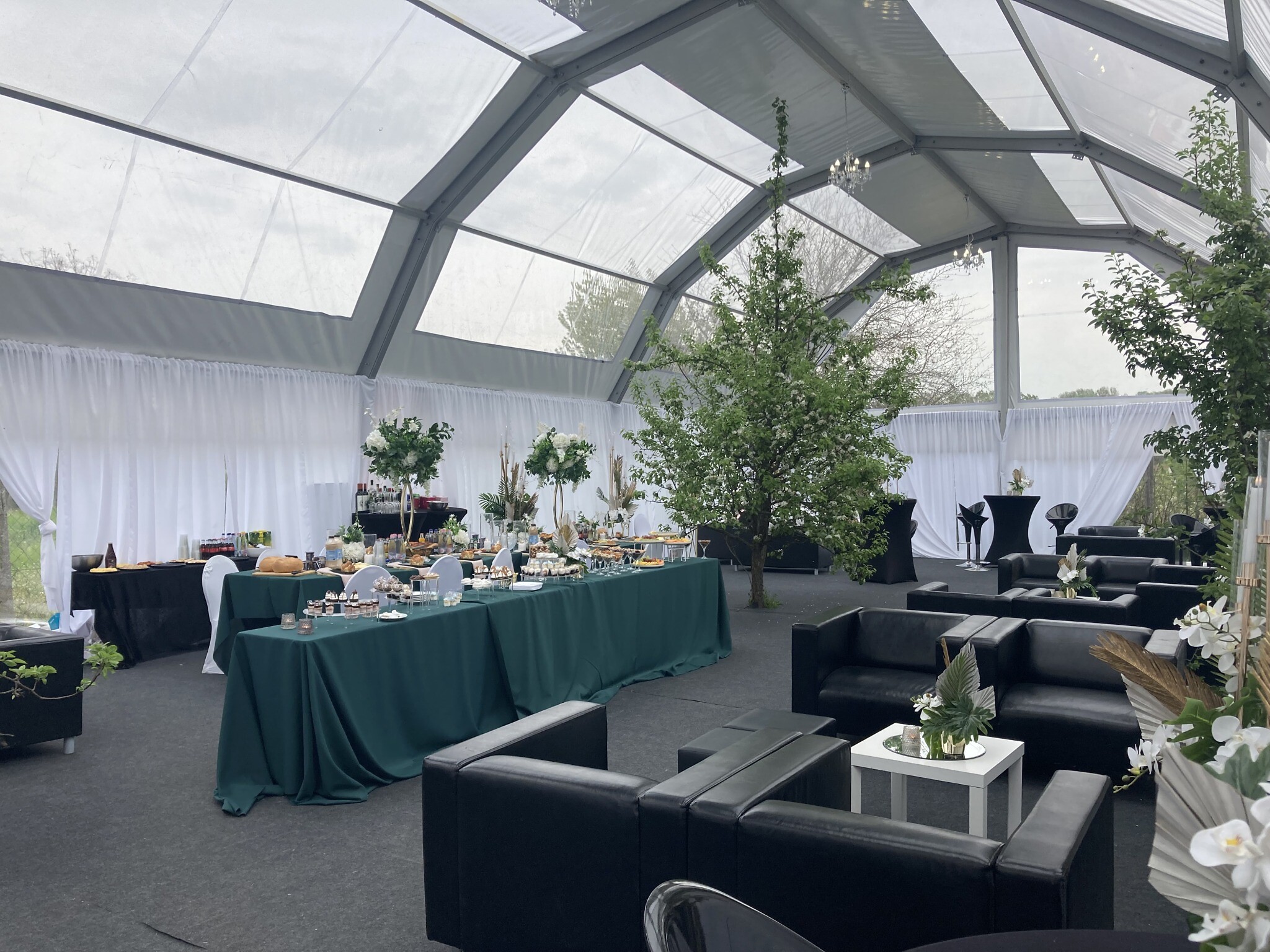 A VIP dining tent for major donors at the annual pilgrimage to the gravesite of 'Wonder Rabbi' Yeshaya Steiner in Bodrogkeresztur, Hungary, April 24, 2023. (Yaakov Schwartz/ Times of Israel)