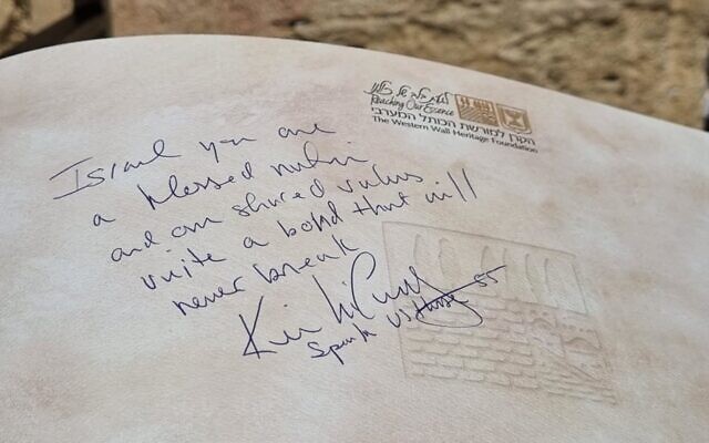 A message written by US House Speaker Kevin McCarthy during a visit to the Western Wall in Jerusalem on April 30, 2023. (Western Wall Heritage Foundation)