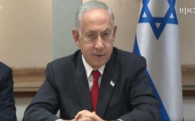 Prime Minister Benjamin Netanyahu speaks to the nation from a meeting of the security cabinet, hours after rocket fire from Lebanon, April 6, 2023. (Kan TV screenshot)