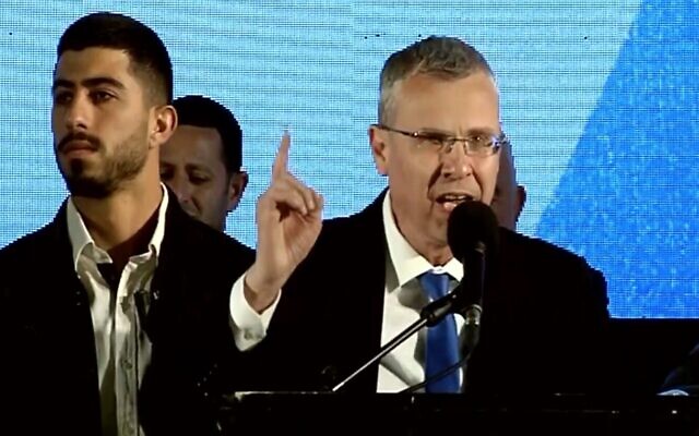 Justice Minister Yariv Levin addresses a rally in support of the judicial overhaul plan he is spearheading, outside the Knesset in Jerusalem on April 27, 2023 (Channel 12 screenshot)