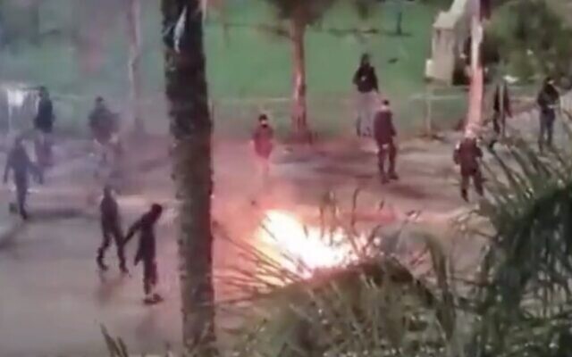In this screenshot of video from social media, rioters burn tires in the northern Arab Israeli city of Umm al-Fahm, April 6, 2023. (Screenshot/Twitter; Used in accordance with Clause 27a of the Copyright Law)