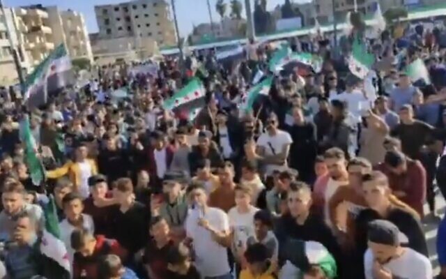 Screencapture from unverified video showing a protest against normalization by Arab nations with the Syrian regime, in the rebel-hold city of Idlib, Syria, April 23, 2023. (Twitter. Used in accordance with Clause 27a of the Copyright Law)