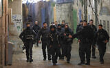 Israeli police patrol in Jerusalem's Old City after a shooting incident early on April 1, 2023. (Ahmad Gharabli/AFP)