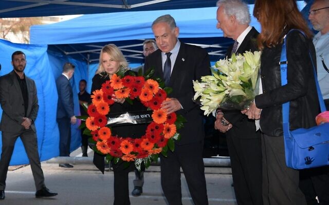 Prime Minister Benjamin Netanyahu and his wife, Sara, lay a wreath at the site of a Tel Aviv terror attack in which Italian tourist Alessandro Parini was killed, April 16, 2023. (Amos Ben Gershom/GPO) Prime Minister Benjamin Netanyahu and his wife, Sara, lay a wreath at the site of a Tel Aviv terror attack in which Italian tourist Alessandro Parini was killed, April 16, 2023. (Amos Ben Gershom/GPO)