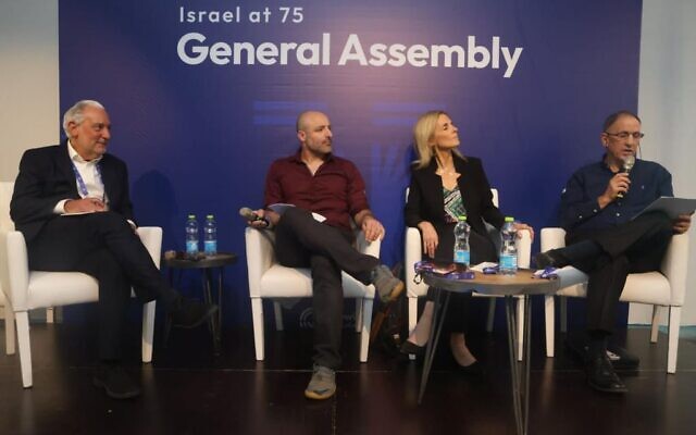 Israeli anti-judicial overhaul protesters participate in a panel at the Jewish Federations of North America's General Assembly conference. L to R: Eric Fingerhut (JFNA president), Yiftach Golov, Ronit Harpaz, Asaf Agmon, Tel Aviv, April 24, 2023. (Jewish Federations of North America/AG)