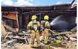 Firefighters work to put out a fire at a home in Tel Sheva, April 30, 2023. (Fire and Rescue Services)