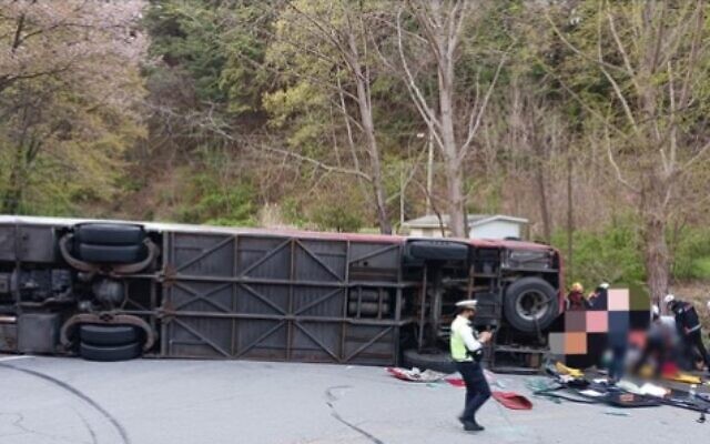 A bus with Israeli tourists on board that flipped over on a road in South Korea, April 13, 2023. (Chungbuk Fire Service)
