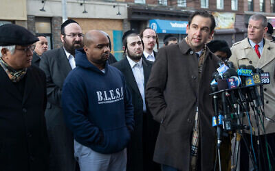 Jersey City Mayor Steven Fulop speaks to reporters at the scene of the shooting at a kosher market, December 11, 2019. (Jennifer Brown/City of Jersey City via JTA)