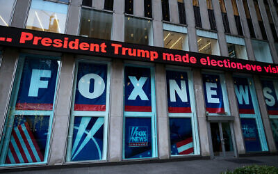 A headline about then US president Donald Trump is displayed outside Fox News studios in New York on November 28, 2018. (AP Photo/Mark Lennihan, File)