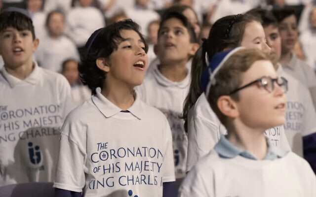 Children from British Jewish schools sing a new version of 'Adon Olam' in honor of the coronation of King Charles III. (Screenshot/YouTube via JTA, used in accordance with clause 27a of the copyright law)