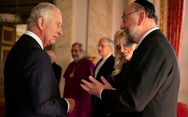 Britain's King Charles III (left) meets Chief Rabbi Ephraim Mirvis during a reception with faith leaders at Buckingham Palace in London on September 16, 2022. (Aaron Chown / AFP)