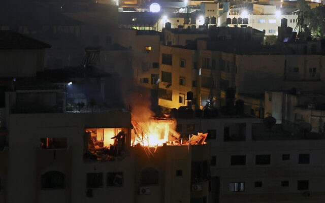 A fire breaks out at an apartment following an explosion in Gaza City on May 9, 2023. (MOHAMMED ABED / AFP)