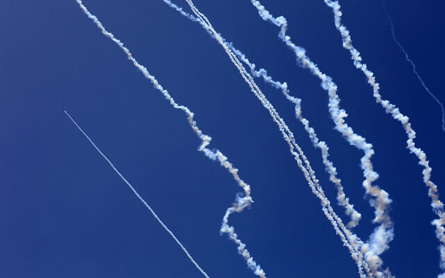 Rockets are fired from the Gaza Strip toward Israel on May 13, 2023. (Said Khatib/AFP)