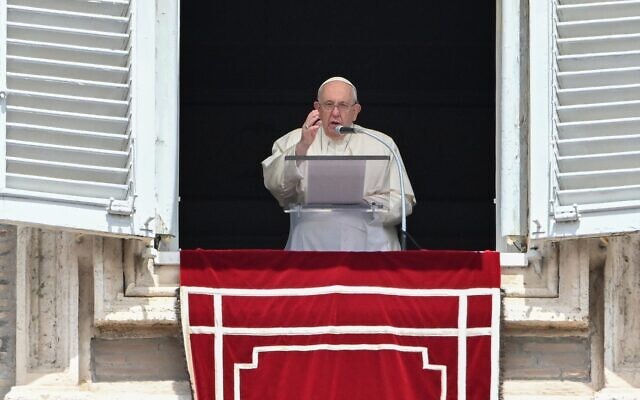 Illustrative: Pope Francis blesses attendees from the window of the apostolic palace overlooking St. Peter's square during the Regina Coeli prayer on May 14, 2023 in The Vatican. (Tiziana FABI / AFP)