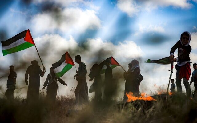 Protesters gather during a Palestinian  demonstration in Gaza along the border with Israel, May 18, 2023, in protest of the Jerusalem Day Flag March. (MOHAMMED ABED / AFP)