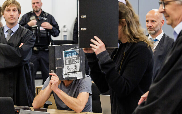 Lina E. (C-R) and another defendant (C-L) in the courtroom at the higher regional court in Dresden, eastern Germany, on May 31, 2023. (Jens Schlueter/AFP)