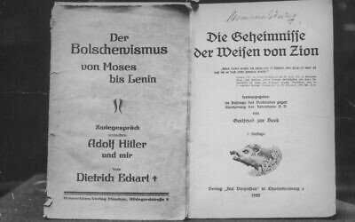 The title pages of a Nazi-published version of 'The Protocols of the Elders of Zion,' an antisemitic text, circa 1935. (Photo by Hulton Archive/Getty Images via JTA)