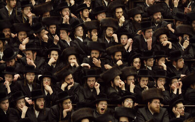In this file photo taken on March 11, 2009, Haredi men gather at a yeshiva in Jerusalem (AP Photo/Kevin Frayer)