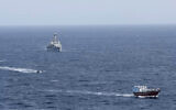 Ilustrative -- In this photo released by Combined Maritime Forces, a boarding team from a British royal navy vessel, the HMS Montrose, transits towards a stateless dhow, a traditional cargo ship that plies the Persian Gulf and surrounding waters, in the northern Arabian Sea, Oct. 14, 2020 (Combined Maritime Forces via AP)