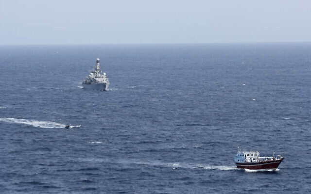 Ilustrative -- In this photo released by Combined Maritime Forces, a boarding team from a British royal navy vessel, the HMS Montrose, transits towards a stateless dhow, a traditional cargo ship that plies the Persian Gulf and surrounding waters, in the northern Arabian Sea, Oct. 14, 2020 (Combined Maritime Forces via AP)
