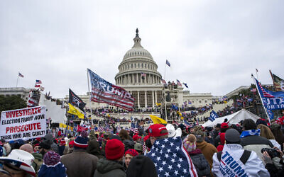 Insurrectionists loyal to then-US president Donald Trump storm the US Capitol in Washington on January 6, 2021. (Jose Luis Magana/AP)