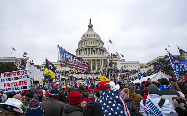 Insurrectionists loyal to then-US president Donald Trump storm the US Capitol in Washington on January 6, 2021. (Jose Luis Magana/AP)